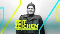 Ein Bundeswehr-Soldat mit Haarnetz