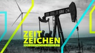 Eine Ölquelle und Windturbinen im Osage Indianerreservat