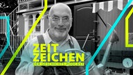 Moderator Peter Lustig mit Gießkanne vor seinem Bauwagen anlässlich eines Pressetermins zur ZDF-Kindersendung "Löwenzahn" (Aufnahme von 2002)