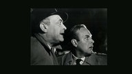 Karl Georg Saebisch (li.) und Herbert Tiede (re.) in "Der Richter und sein Henker" (1957)