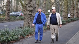 Zwei Männer in Arbeitskleidung