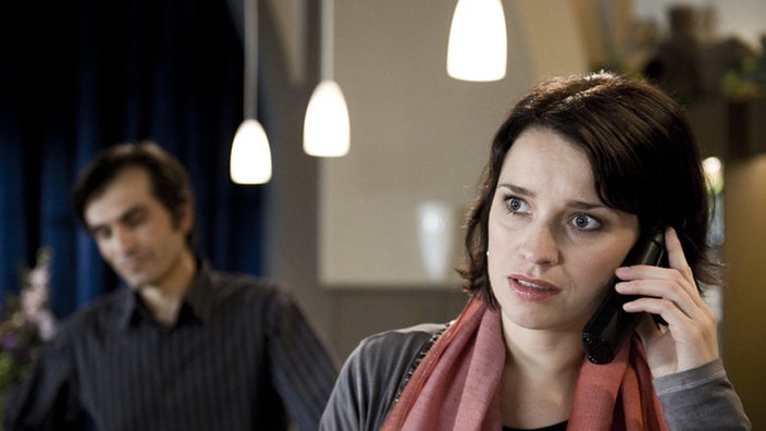 Angelina und Vasily stehen im "Akropolis"