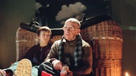 Backhaus und Tom sitzen zusammen