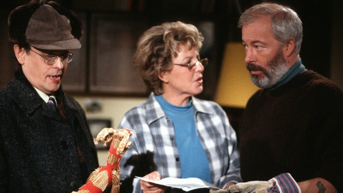 Das hat gerade noch gefehlt! Erich (Bill Mockridge, rechts) und Helga (Marie-Luise Marjan) sind empört über Hülschs (Horst Scheel) angekündigte Mieterhöhung.
