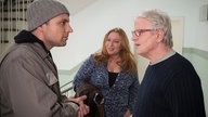 Enzo, Iffi und Andy reden im Treppenhaus