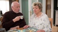 Helga und Erich unterhalten sich