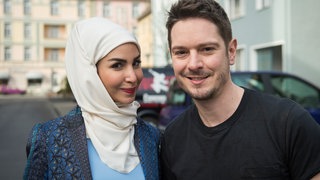 Yildiz und Timo lächeln in die Kamera