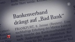 Ein Zeitungsartikel mit der Überschrift: Bankenverband drängt auf "Bad Bank"