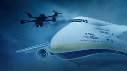 Drohne vor Antonov-Flugzeug
