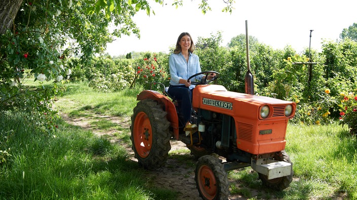Leslie Clostermann auf dem Traktor.