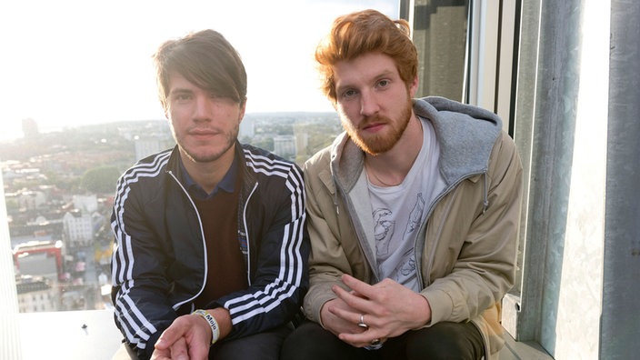 Band members Roman Rappak and Adam Ainger beyond stage, just two nice looking guys.