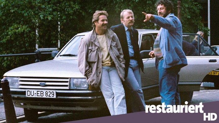 Schimanski mit Thanner und "Hänschen" am Auto