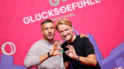Lukas Podolski and Markus Krampe beim Glücksgefühle-Festival