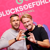 Lukas Podolski and Markus Krampe beim Glücksgefühle-Festival