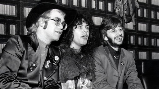 Weggefährten waren Elton John (l.), Marc Bolan und Ringo Starr.