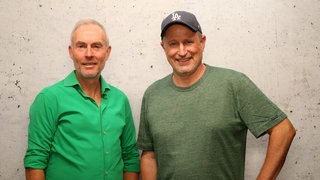 Johann König (l) und WDR 2 Moderator Olli Briesch