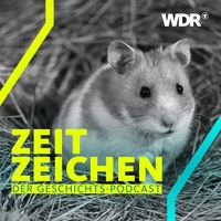 Goldhamster sitzt im Heu