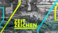 Expeditions-Teilnehmer kämpfen auf einem Floß gegen das reißende Wasser