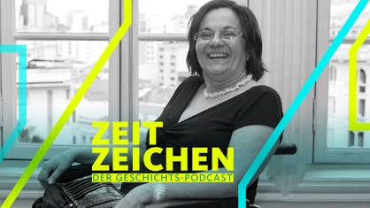 Maria da Penha im Rollstuhl