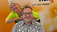 Comedian Paul Panzer und Moderatorin Heike Knispel im WDR 4-Studio