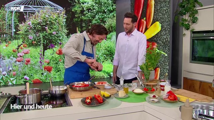 Gratinierte Spitzpaprika mit Lachs und Pinienkern-Reis