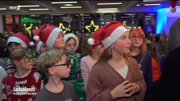 Reporterin Nicole Werner berichtet vom Mitsing-Abend für das Weihnachtswunder