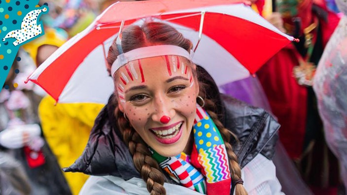 Karnevalistin mit Regenschirm 