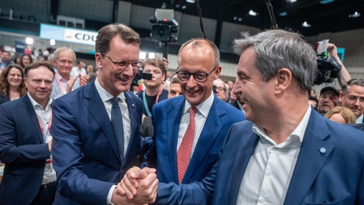 Wüst, Söder und Merz