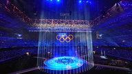 Olympischen Sportler laufen ein
