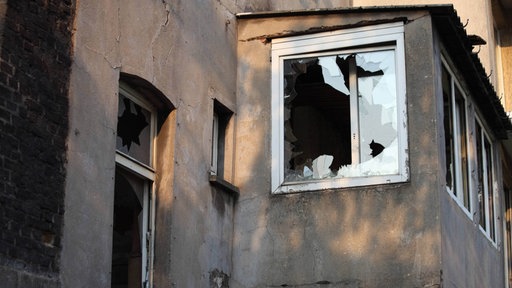 Zersplittertes Fenster an einem Haus