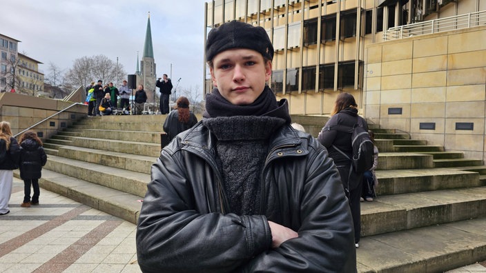 Portrait eines jungen Erwachsenen mit Mütze