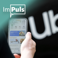 Ein Handy auf dem die Uber-App geöffnet ist 