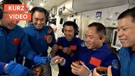 Chinesische Astronauten beim Space-BBQ
