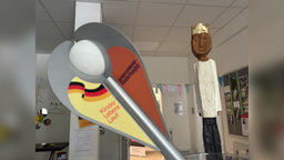 Im Büro - Bilder vom Fackellauf für kranke Kinder