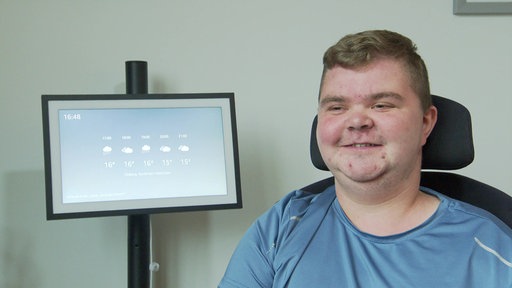 Simon Rose lächelt in die Kamera