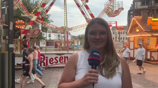 Eine Reporterin berichtet von den Libori-Kirmes in Paderborn.