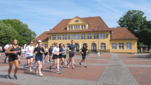 Gruppenbild des Up Running Clubs bei gemeinsamen Lauf