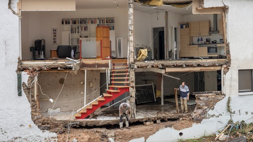 Ein zerstörtes Haus nach Hochwasser