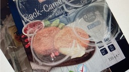 eine leere Packung Back-Camembert