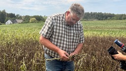 Bauer mit trockenem Acker, Carsten Broecker