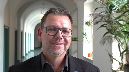 Gunnar Ohrndorf guckt lächelnd in die Kamera
