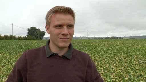 Ein Mann auf einem Feld