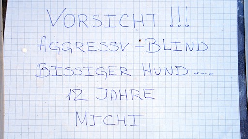 Zettel mit Aufschrift