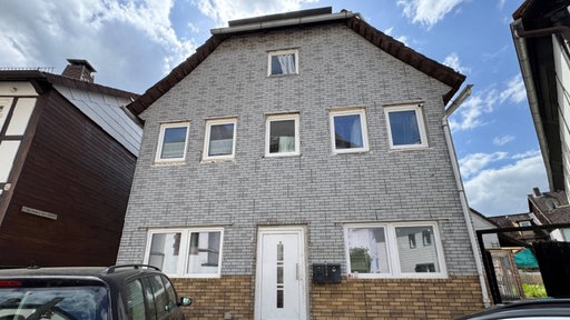 Auf dem Bild ist ein Haus zu sehen.