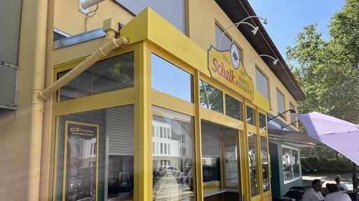 Eingang com Imbiss von außen