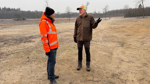 Besprechung im gerodeten Moor