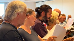 Tenorsänger bei der Chorprobe