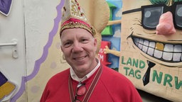 Das Bild zeigt ein Mitglied des Comitee Düsseldorfer Carneval.