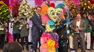 NRW-Ministerpräsident Wüst (CDU) und Verantwortliche der Landesgartenschau bei der Eröffnung.