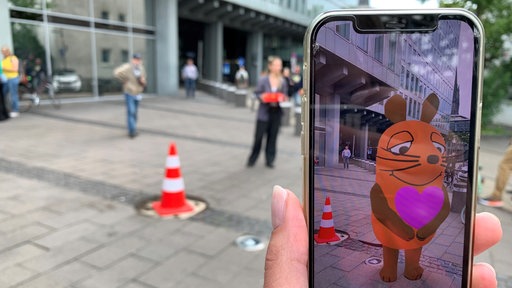 Handybildschirm zeigte eine virtuelle Maus